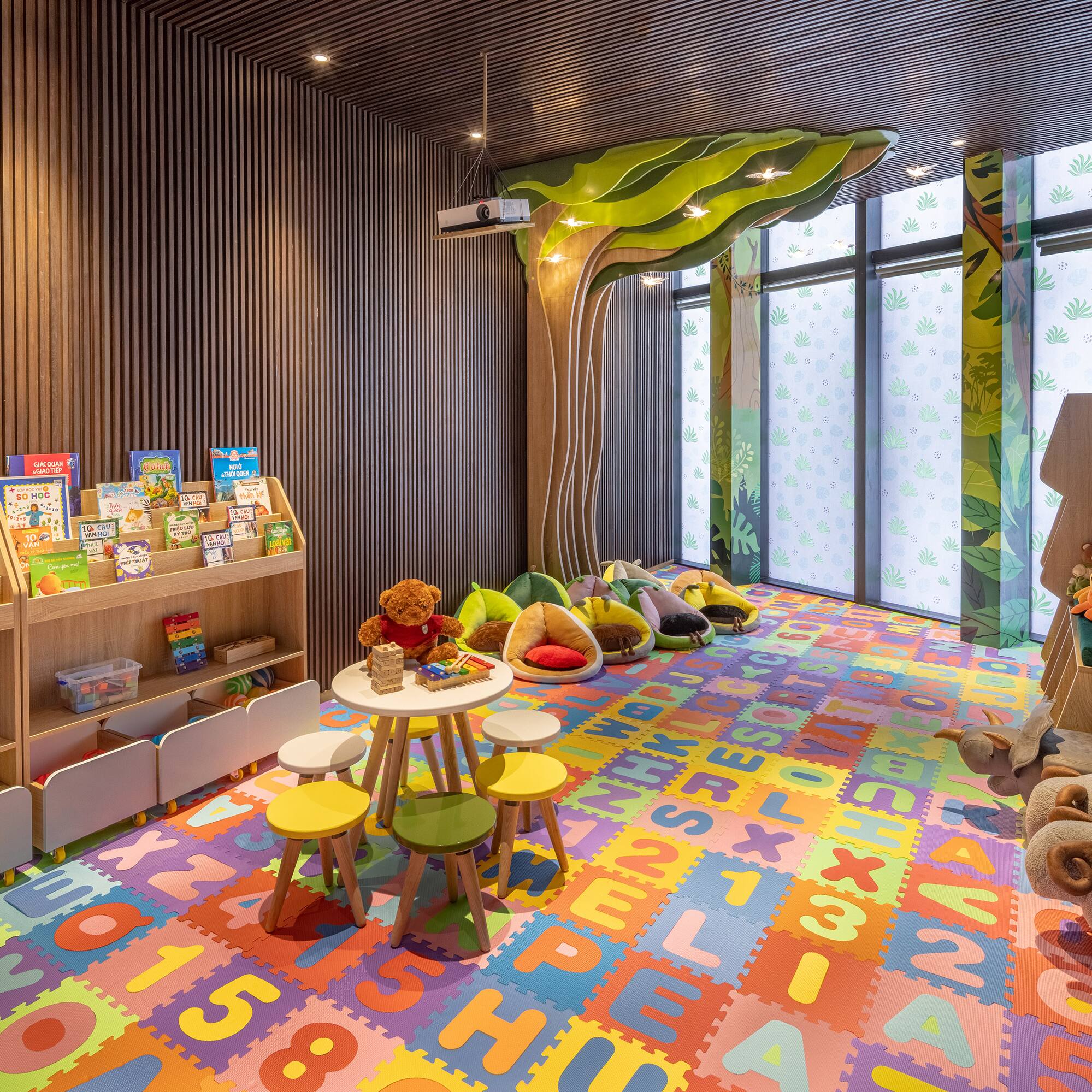 a room with colorful carpet and toys