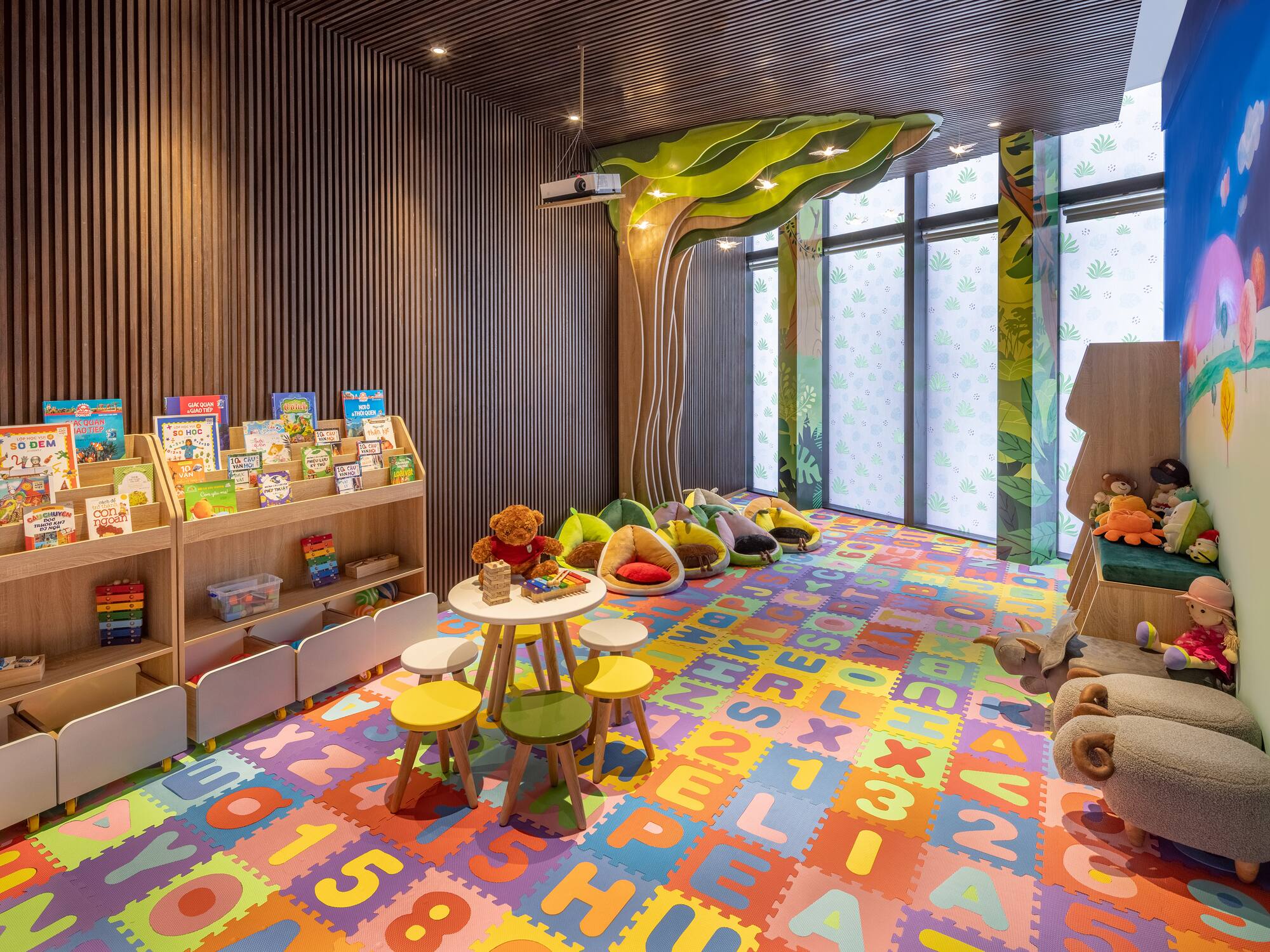 a room with colorful carpet and toys