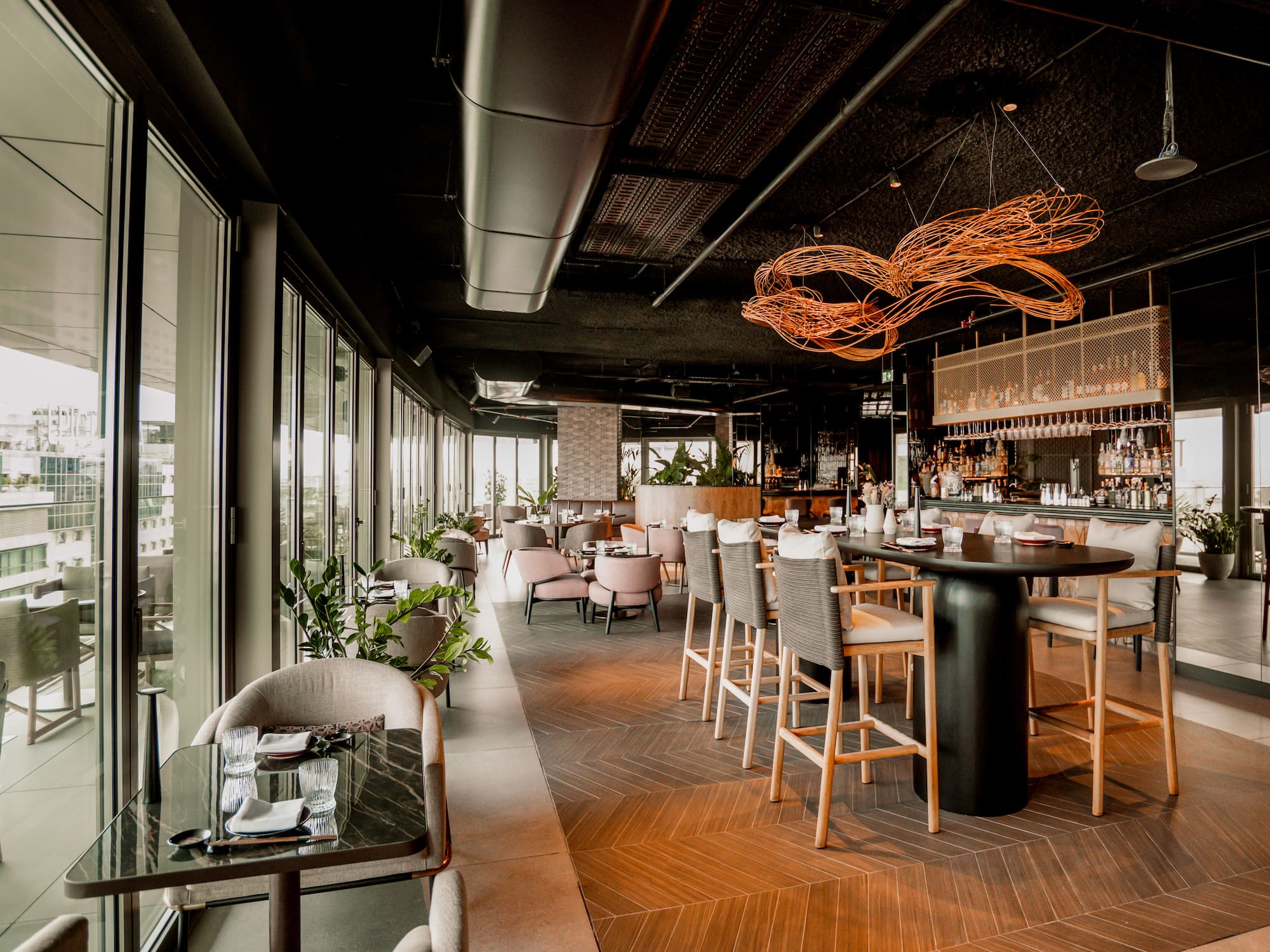 a restaurant with tables and chairs