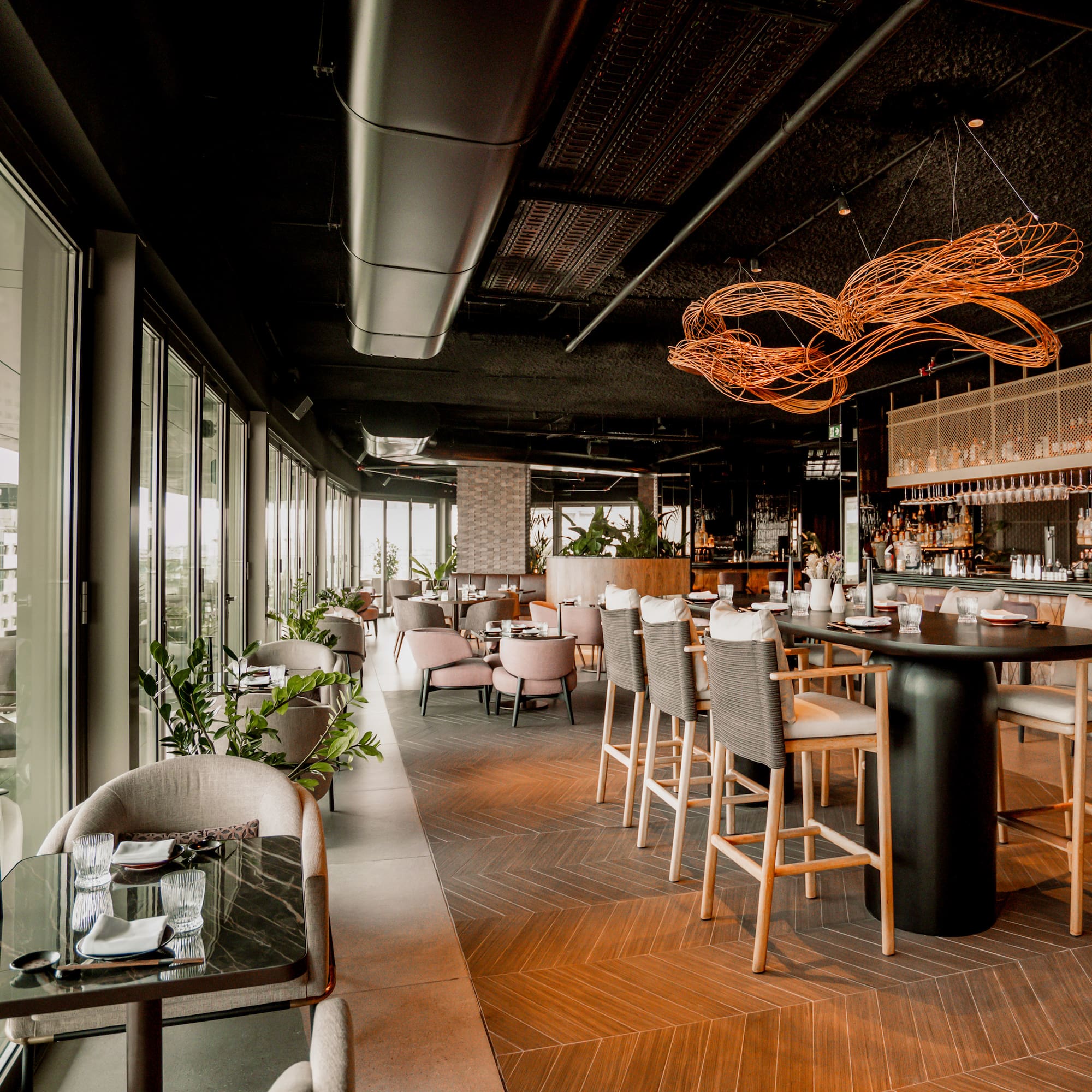 a restaurant with tables and chairs