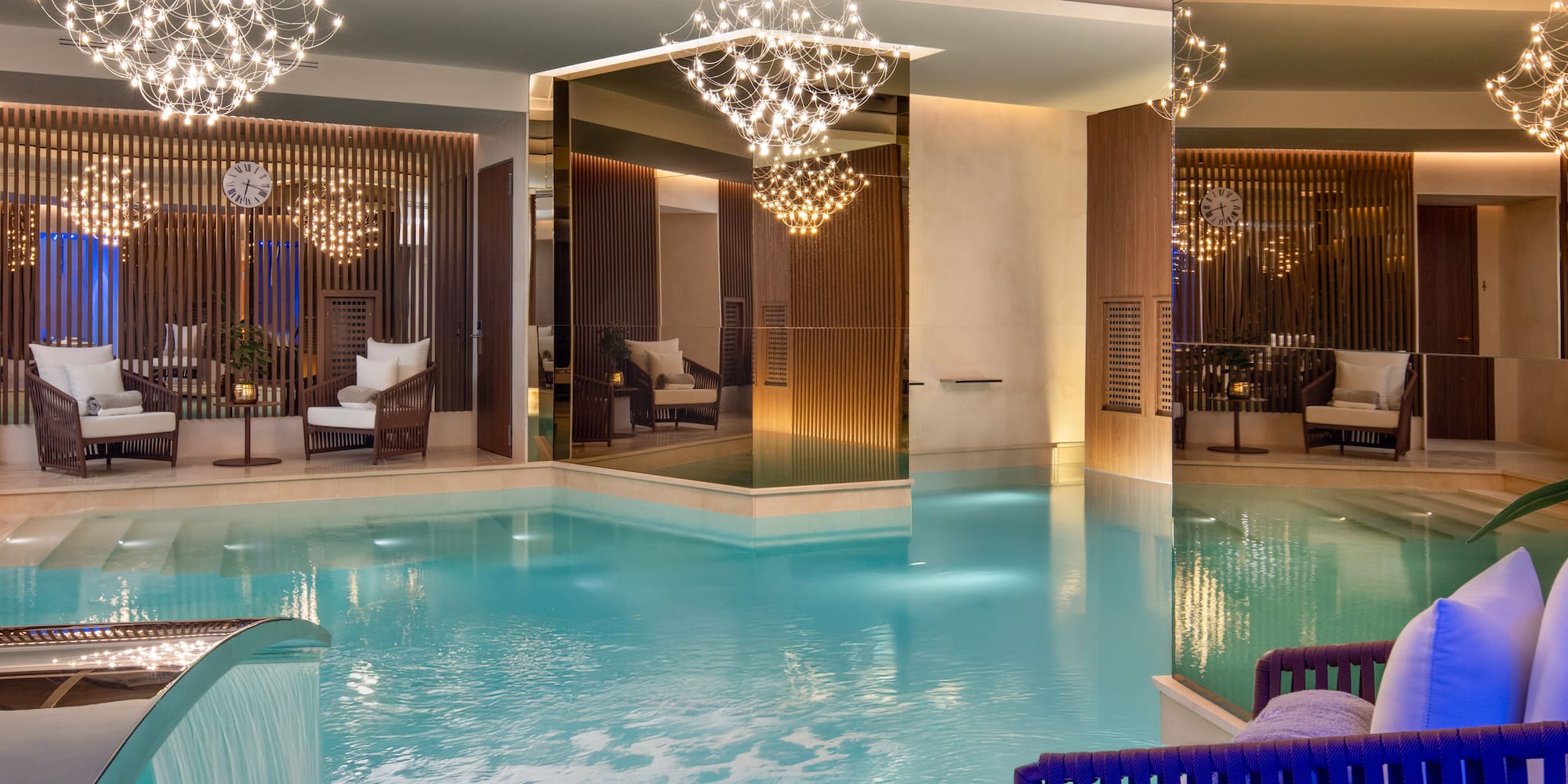 a swimming pool with a chandelier