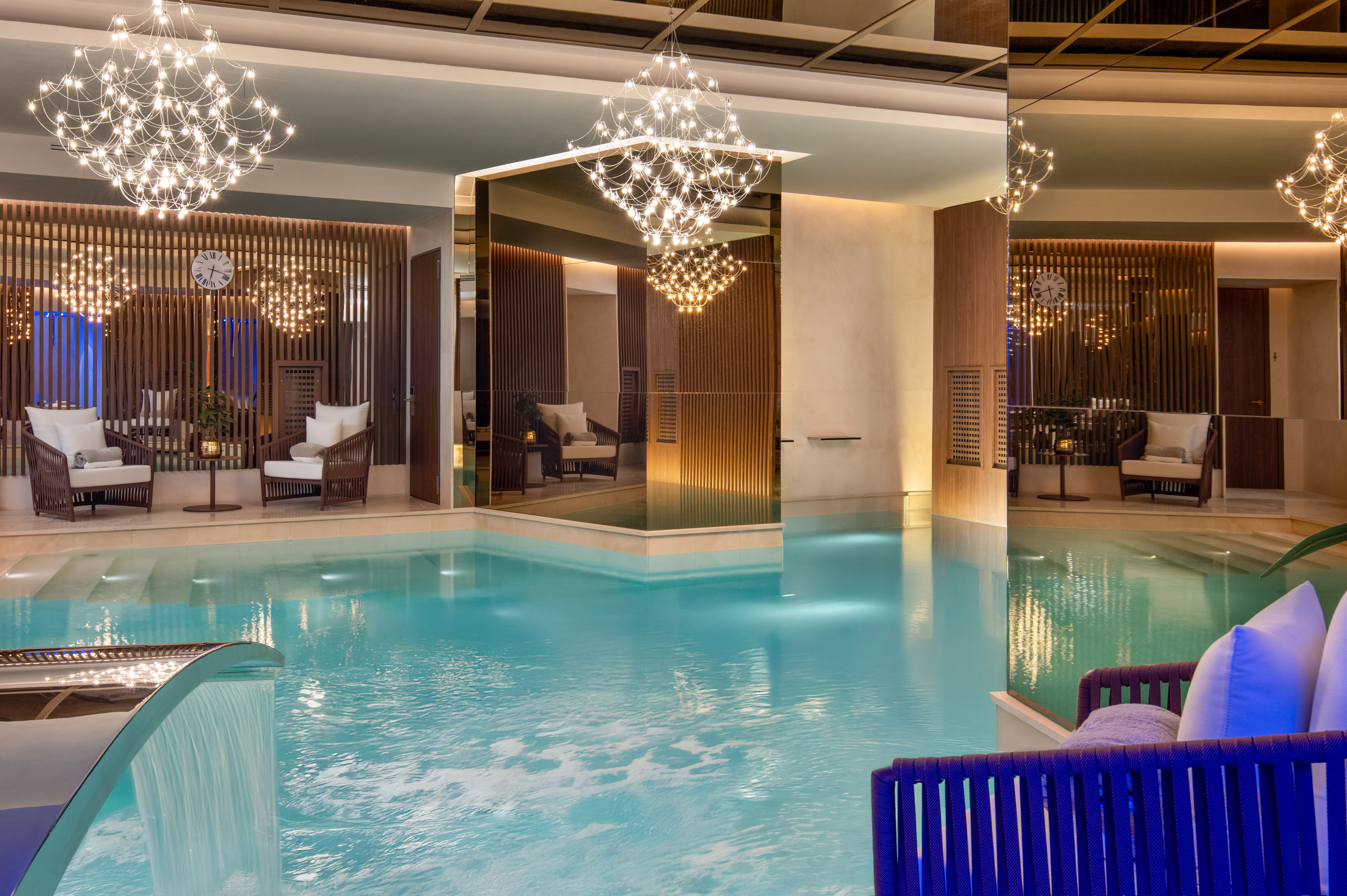 a swimming pool with a chandelier