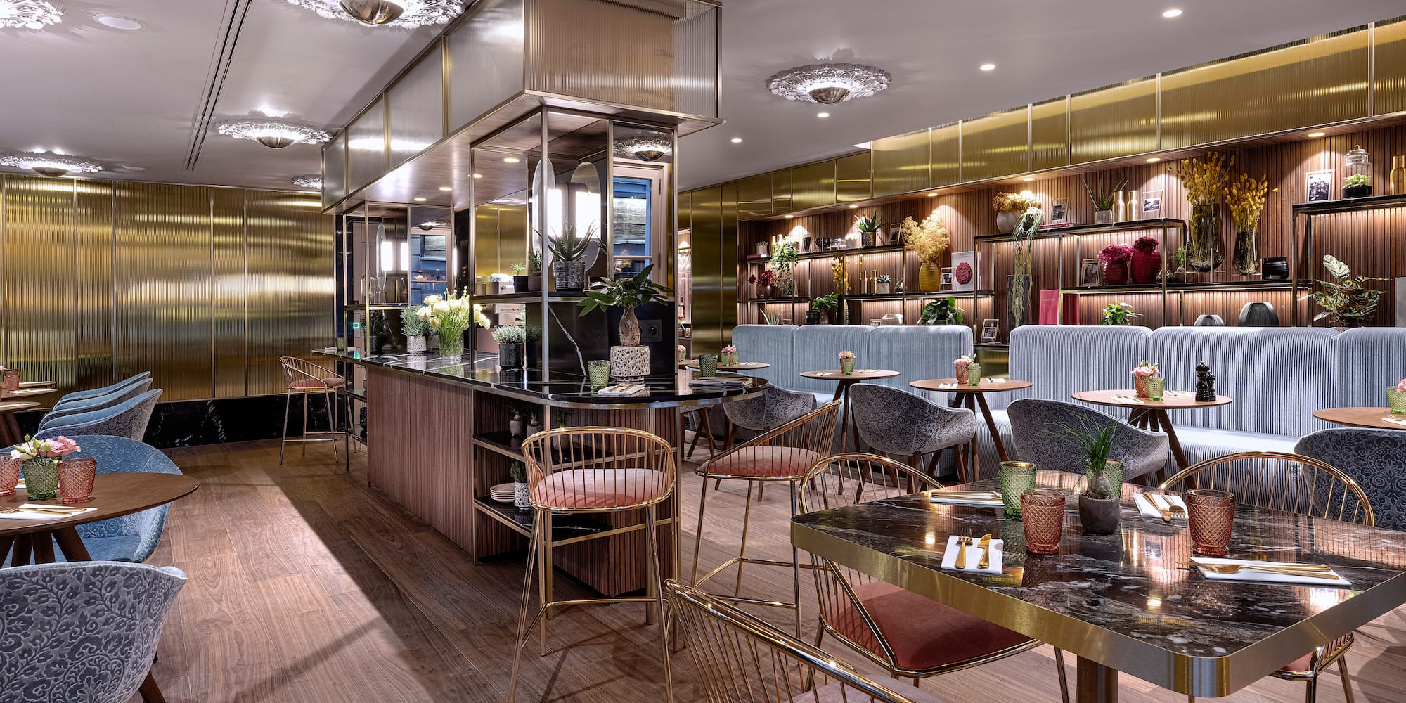 a restaurant with tables and chairs