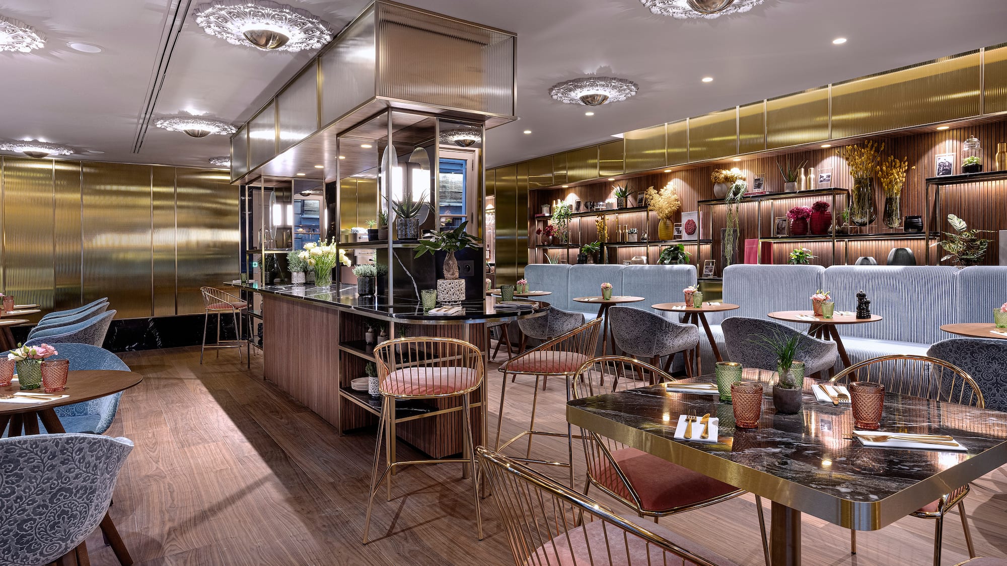 a restaurant with tables and chairs