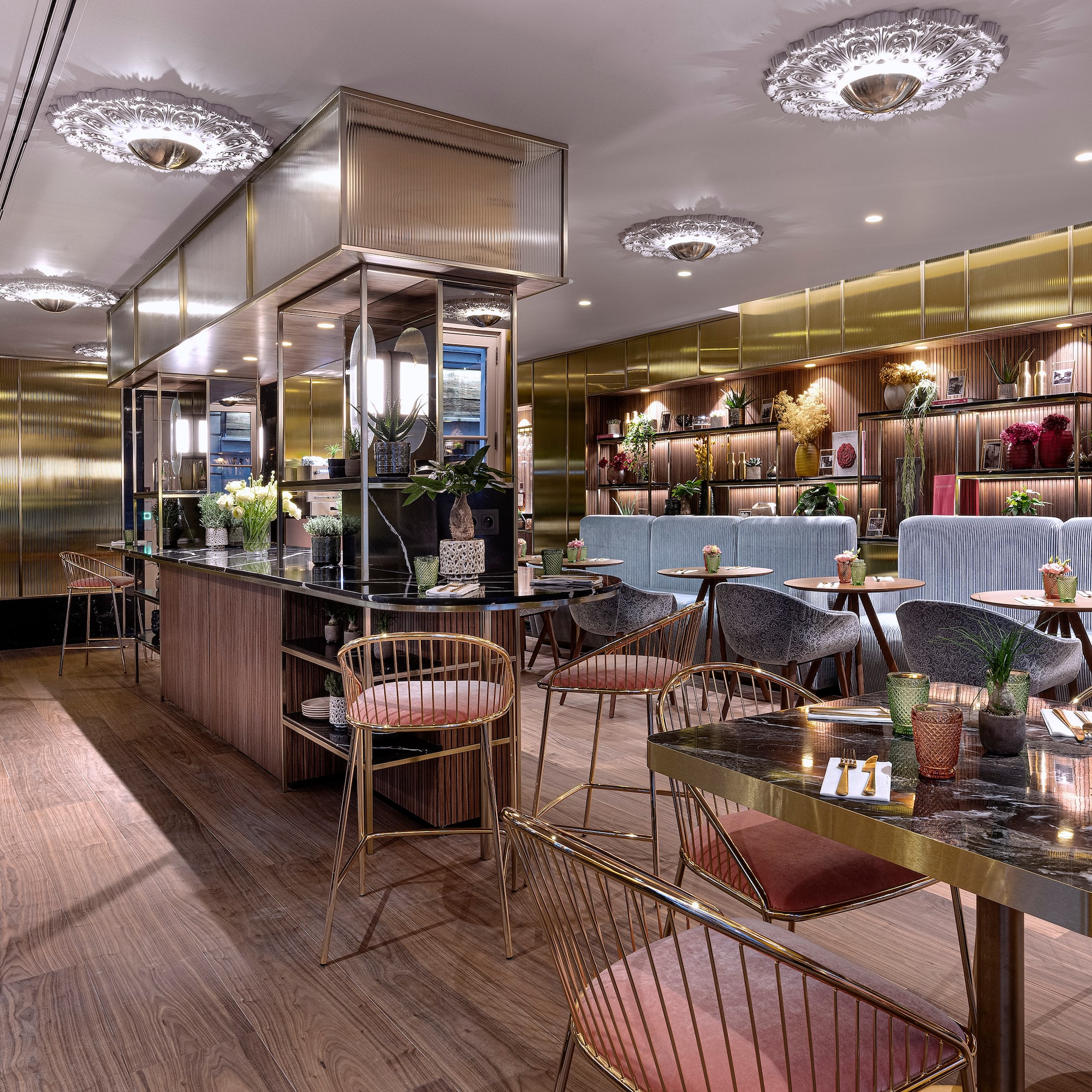 a restaurant with tables and chairs