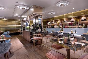 a restaurant with tables and chairs