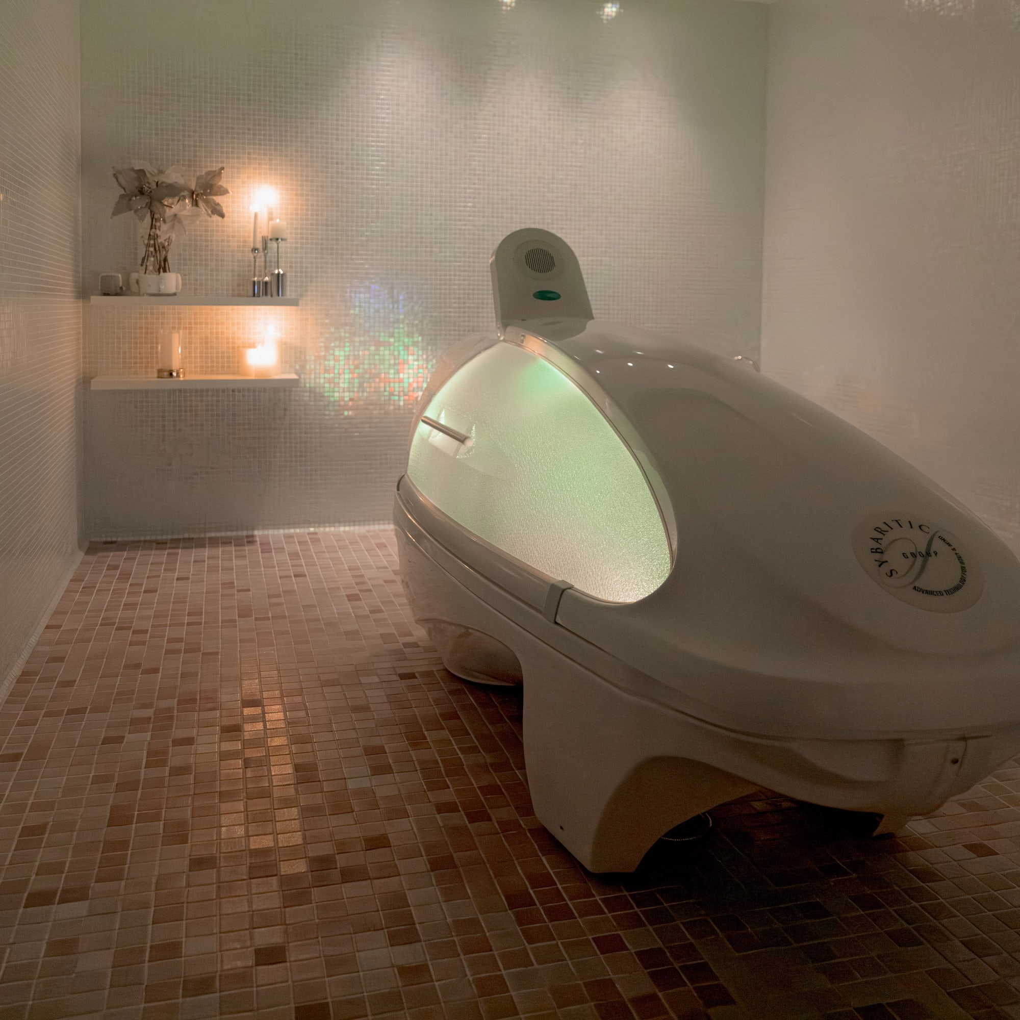 a white oval shaped object in a tiled room