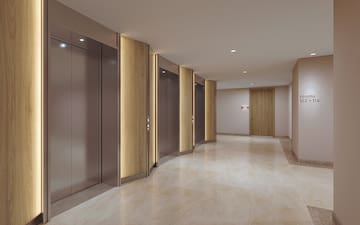a hallway with elevators and doors
