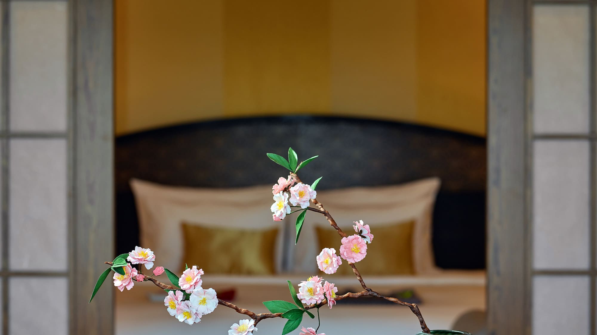 a vase with flowers on it