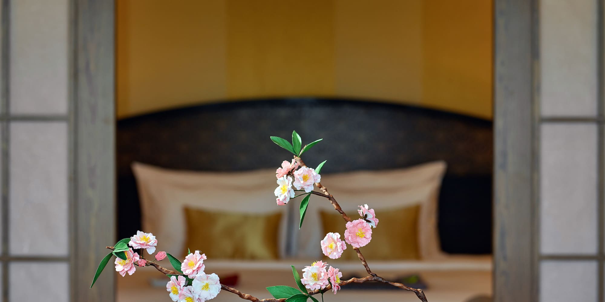 a vase with flowers on it