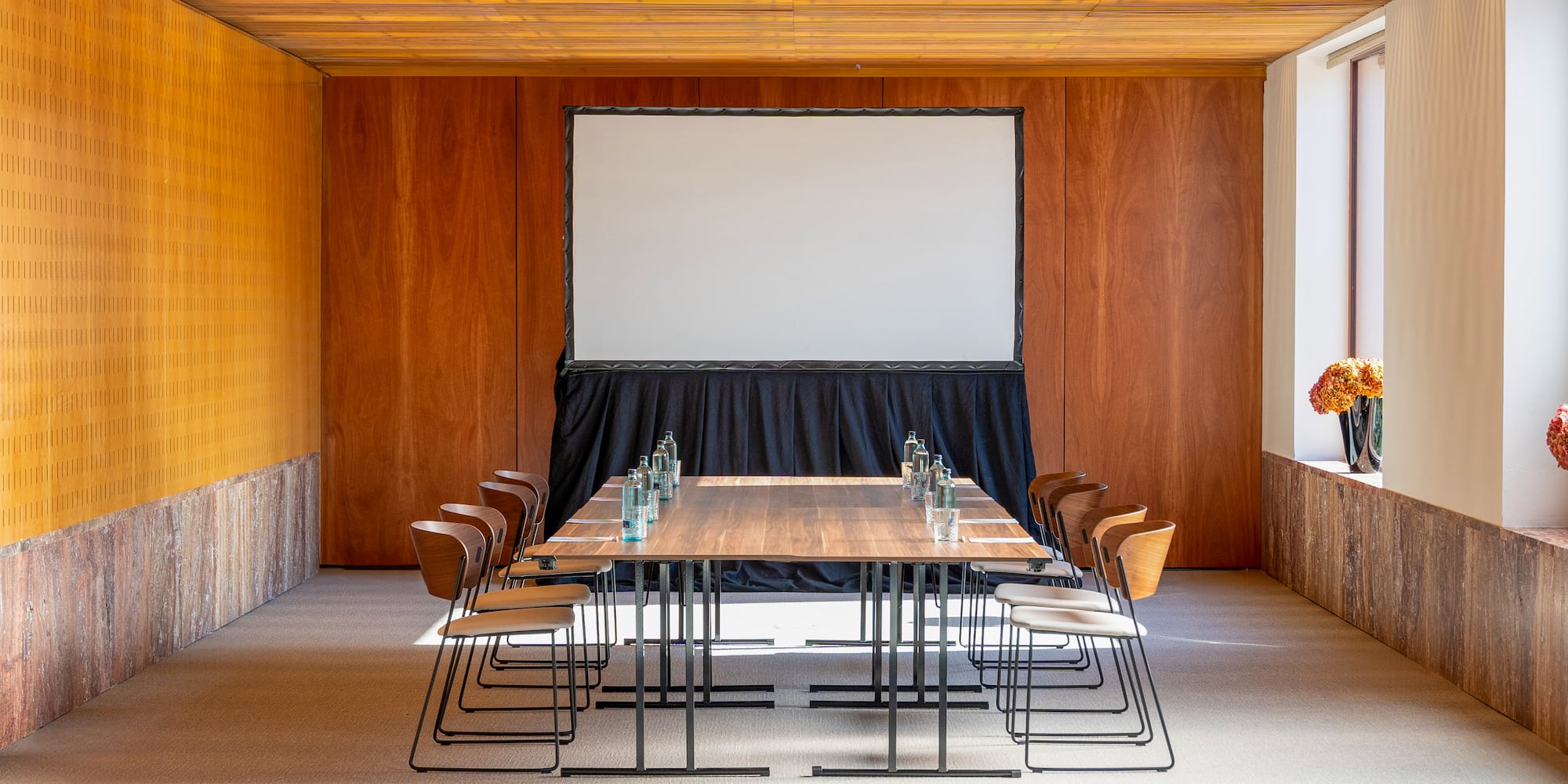 a room with a table and chairs
