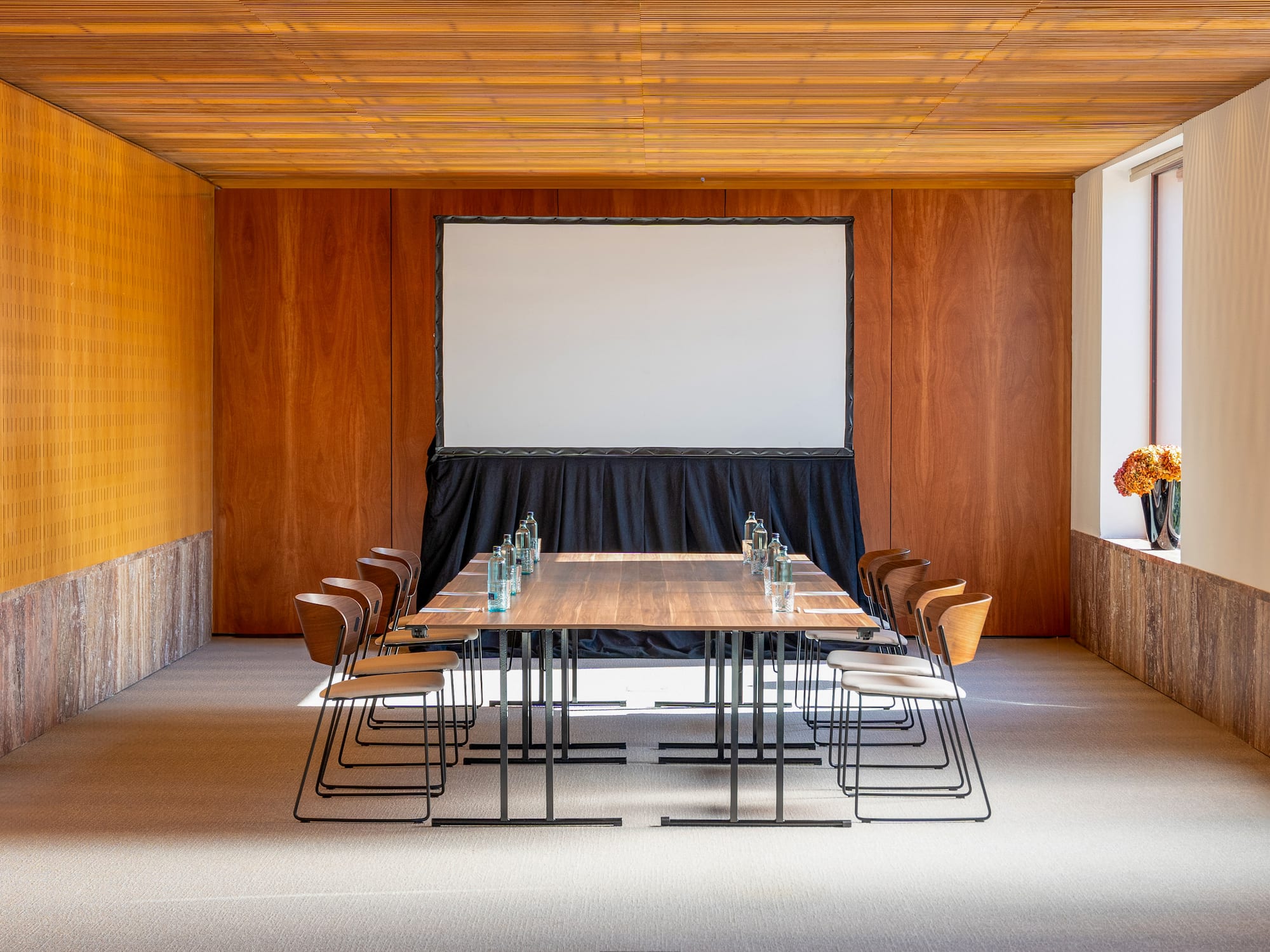 a room with a table and chairs