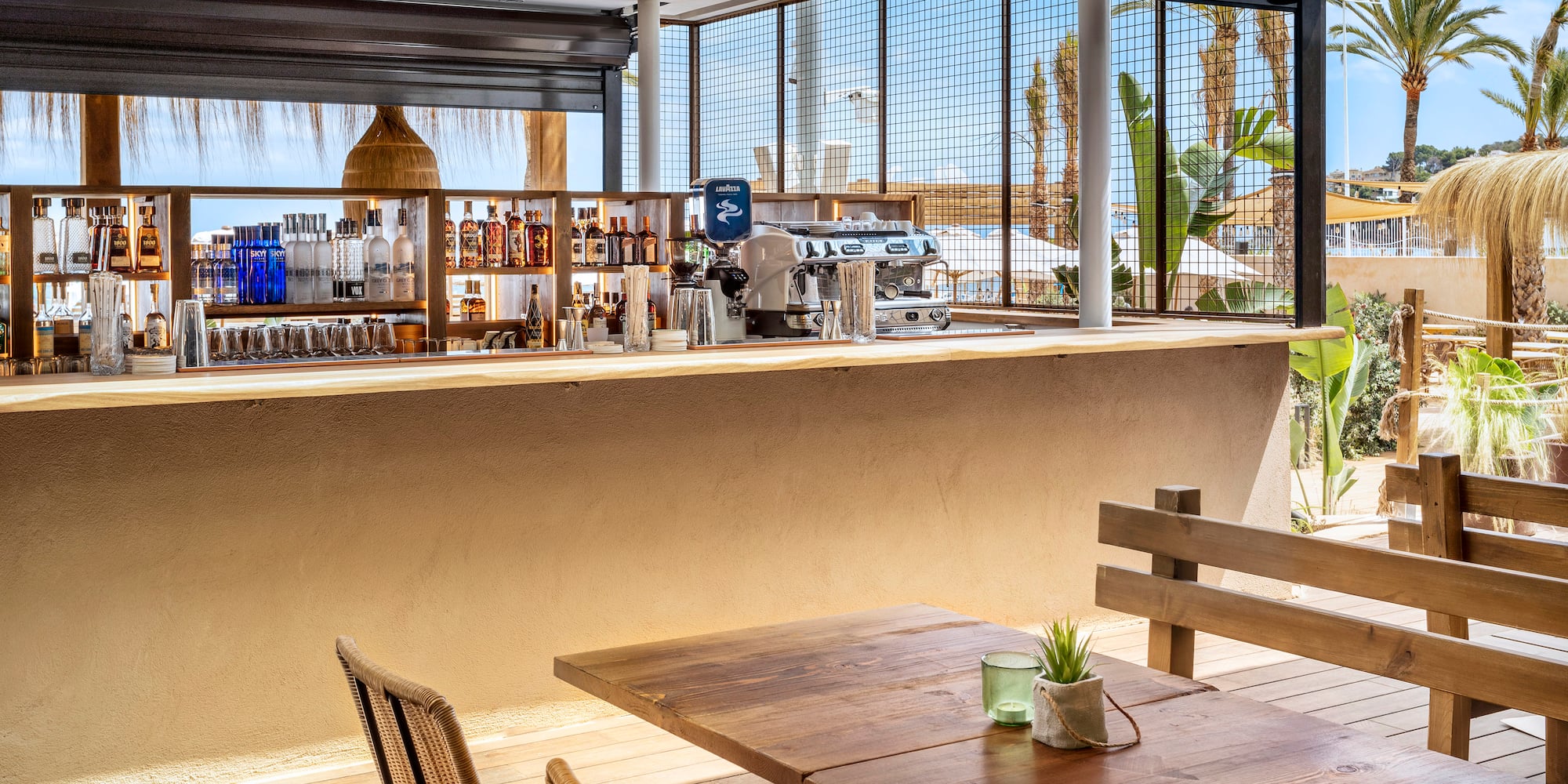 a table and chairs outside a bar