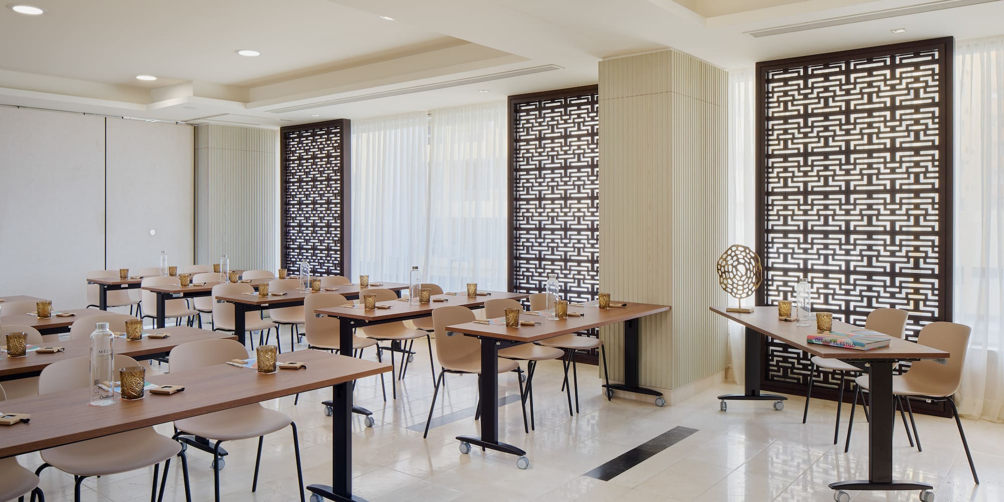 a room with tables and chairs