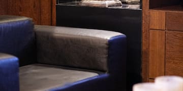 a statue in a glass case