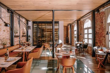 a room with tables and chairs