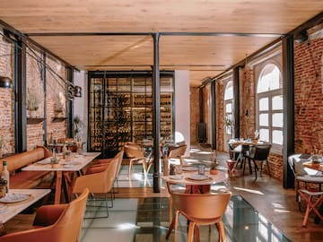 a room with tables and chairs