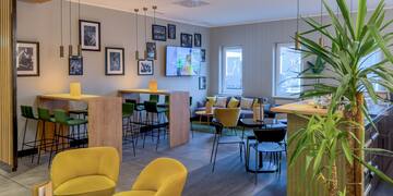 a room with tables and chairs