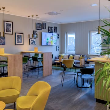 a room with tables and chairs