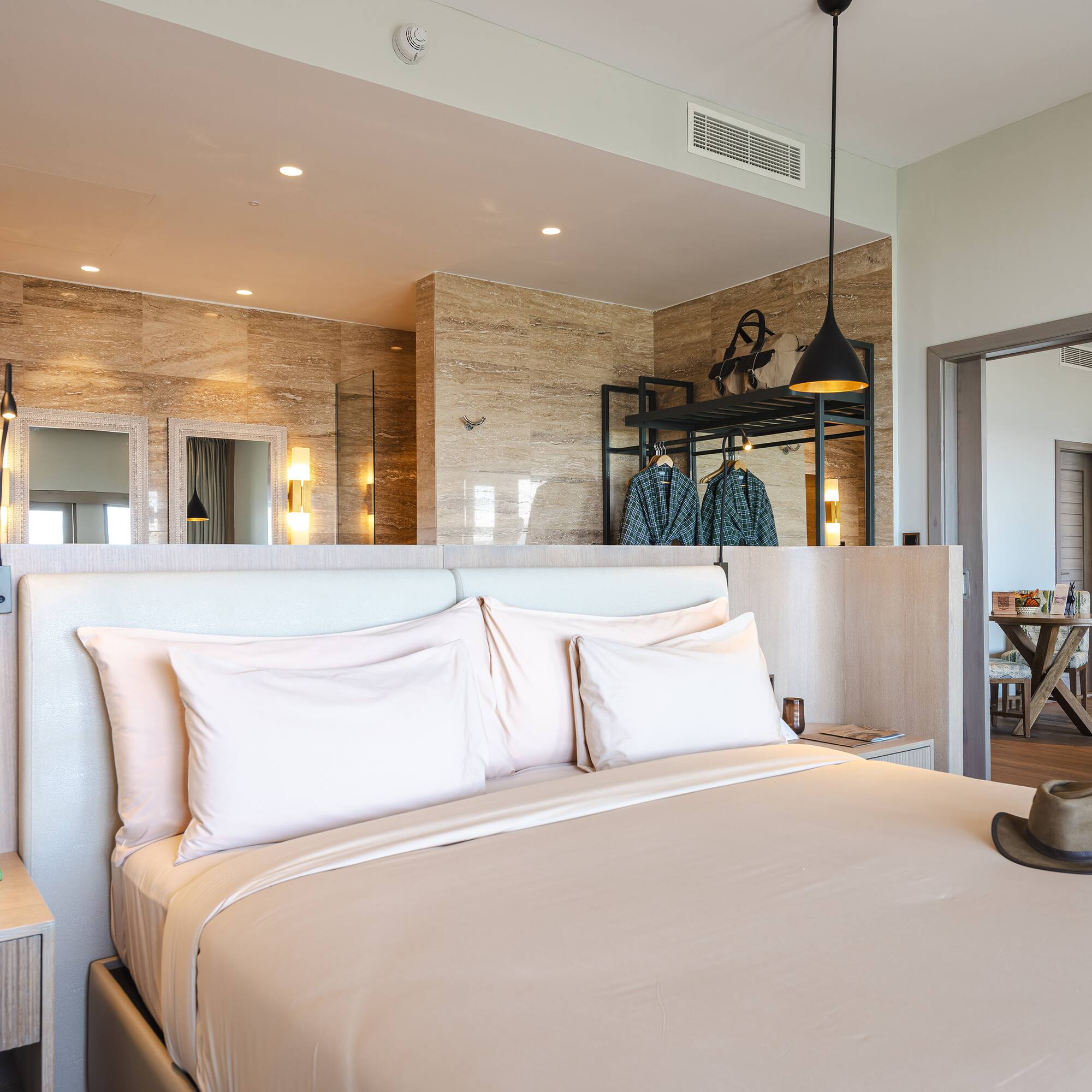 a bed with a hat on it