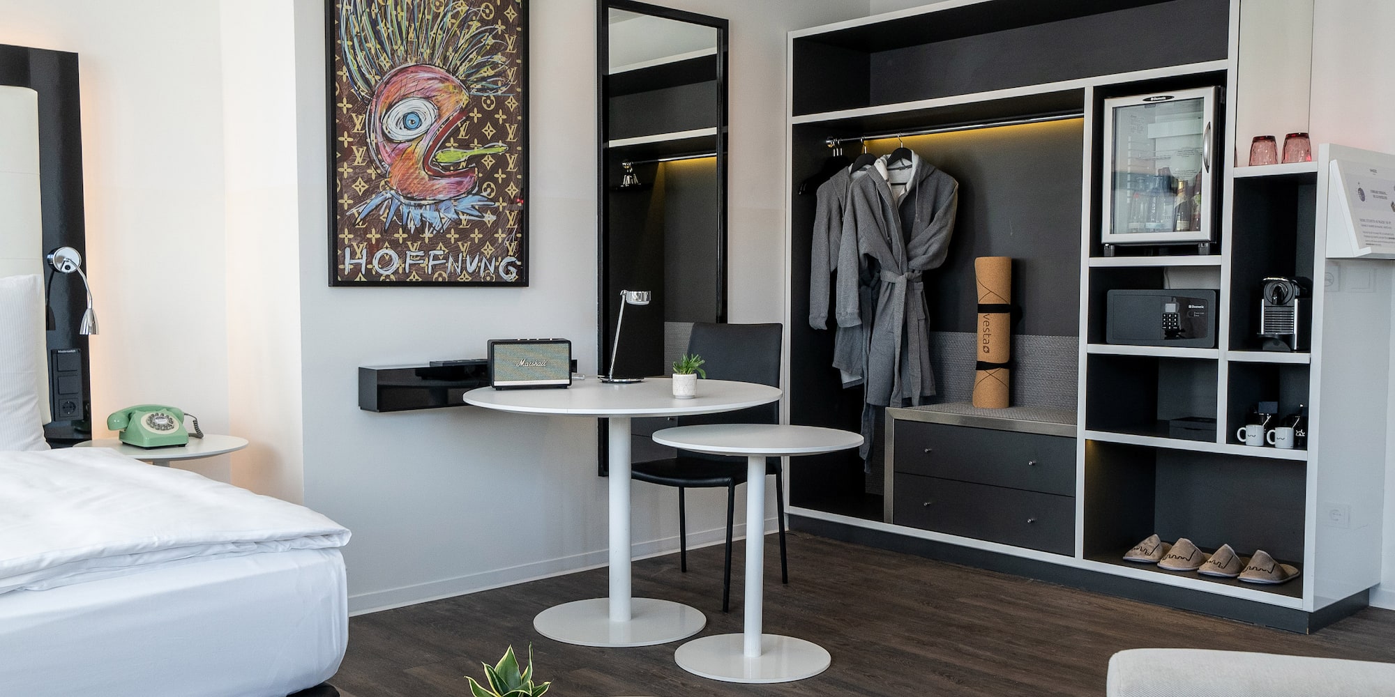 a room with a table and a mirror