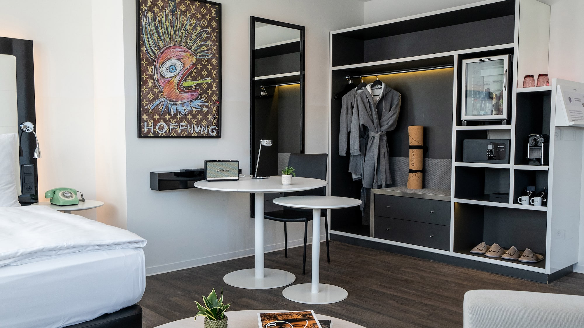 a room with a table and a mirror