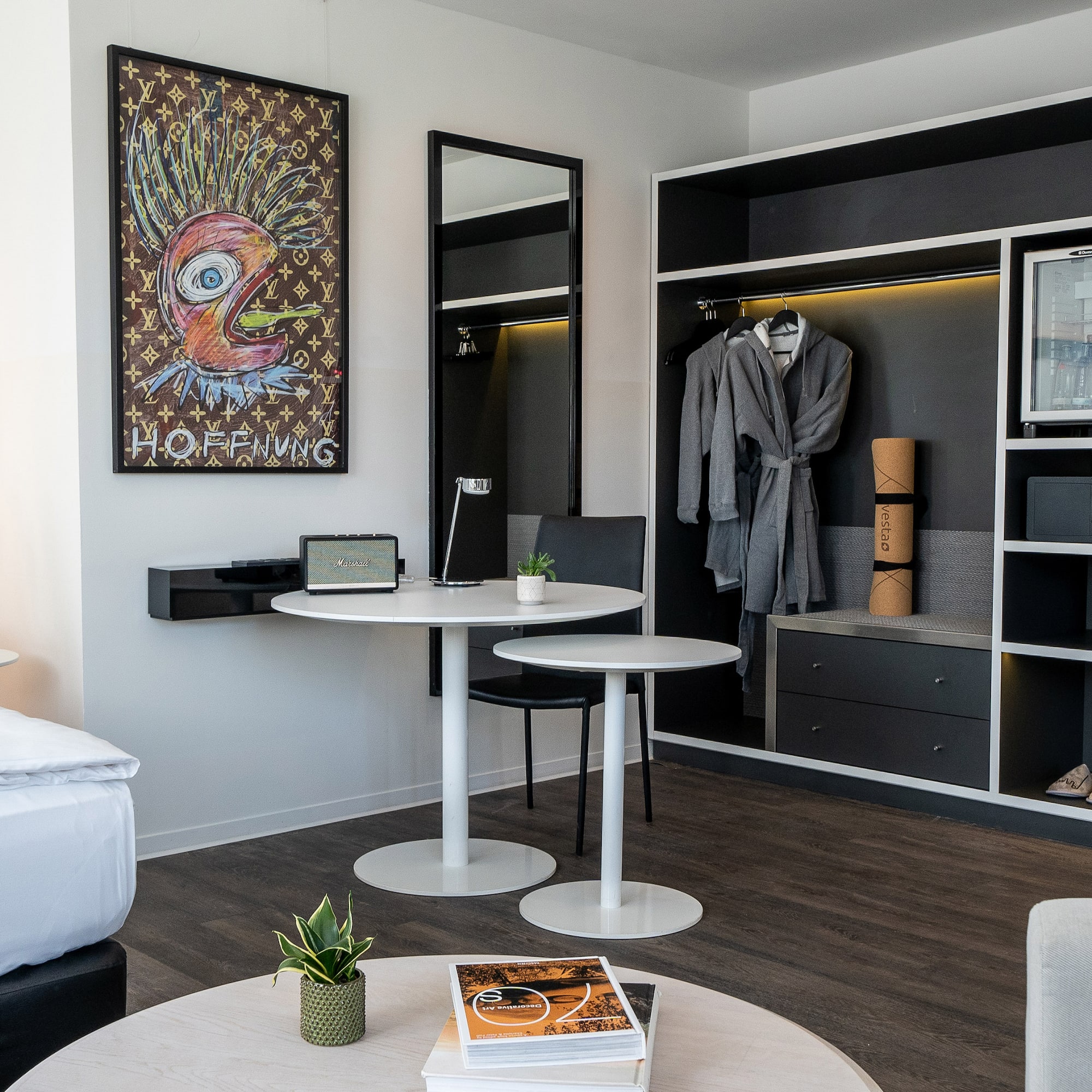 a room with a table and a mirror