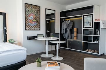 a room with a table and a mirror