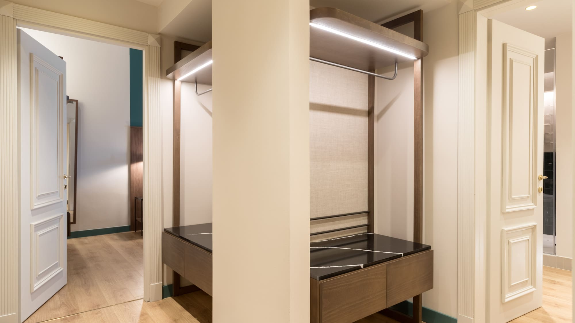 a closet with a bed and a shelf