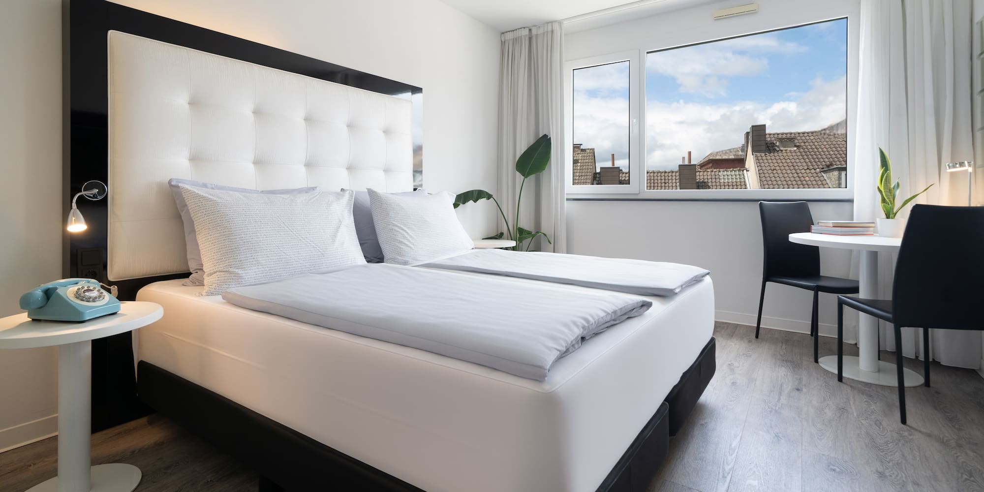 a room with a bed and a table