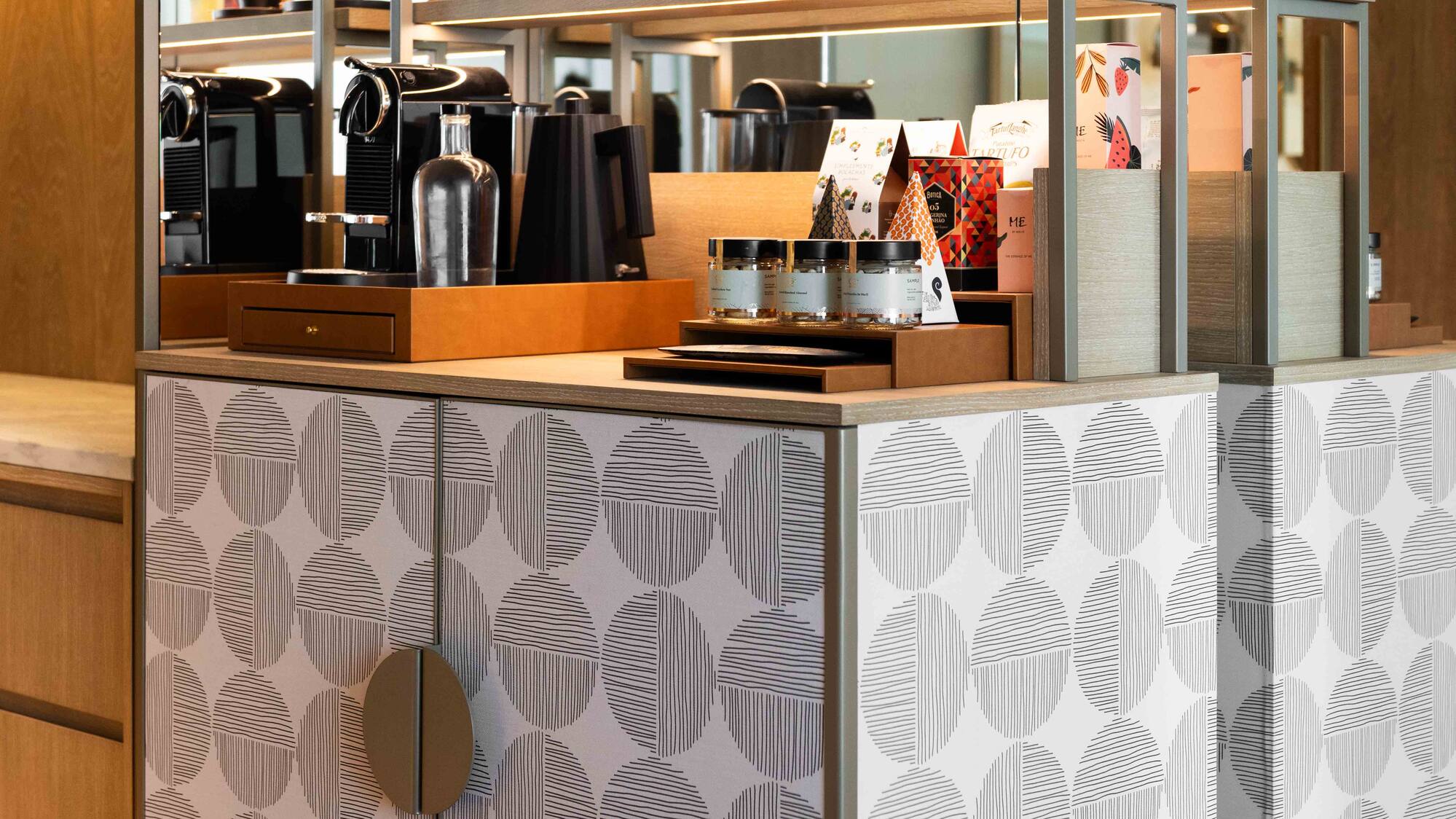 a counter with shelves and objects on it