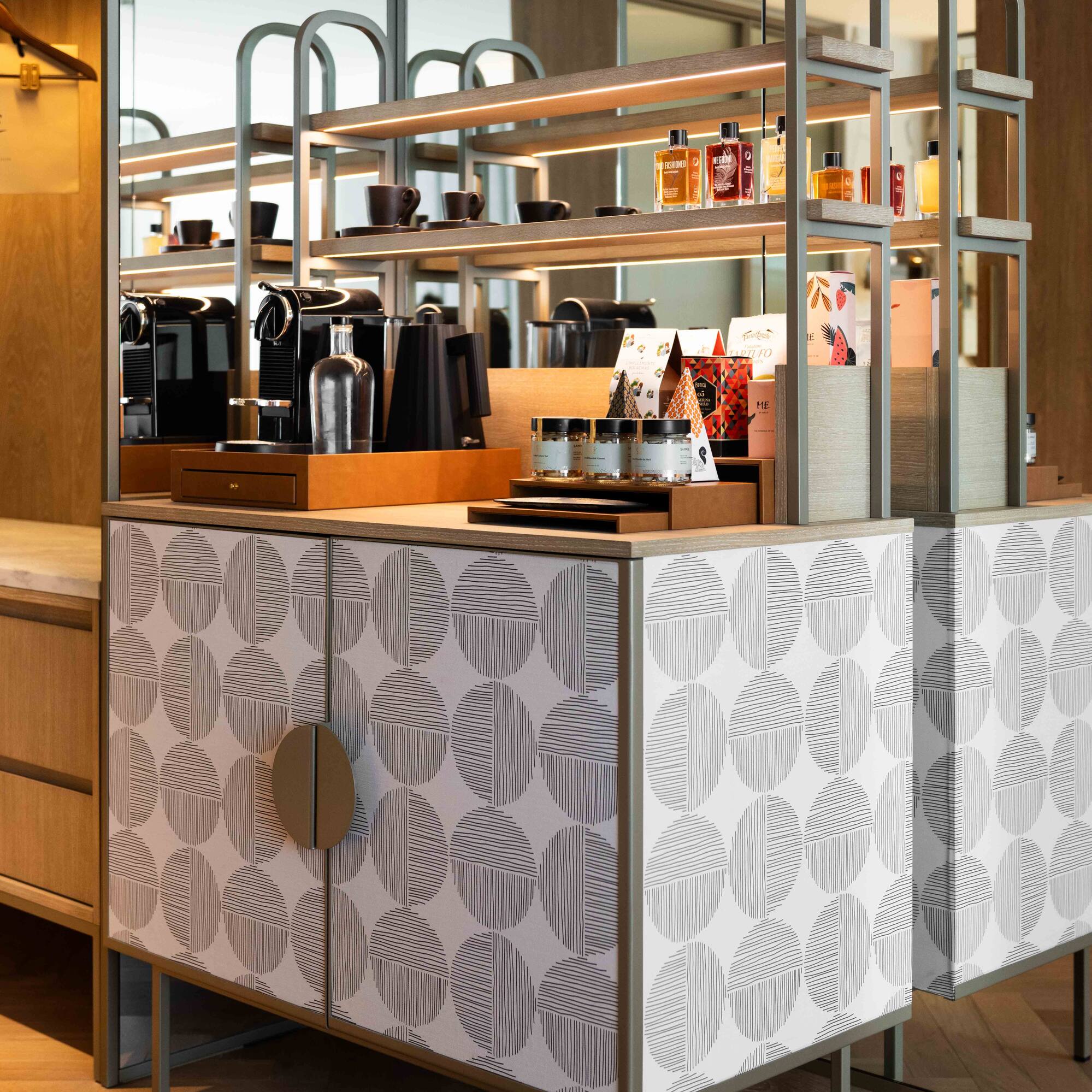 a counter with shelves and objects on it