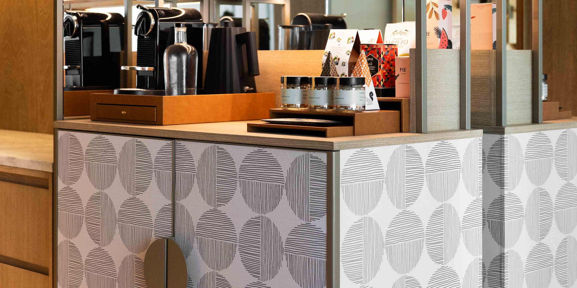 a counter with shelves and objects on it