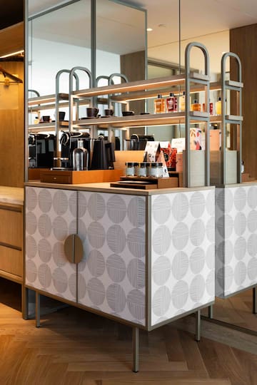 a counter with shelves and objects on it