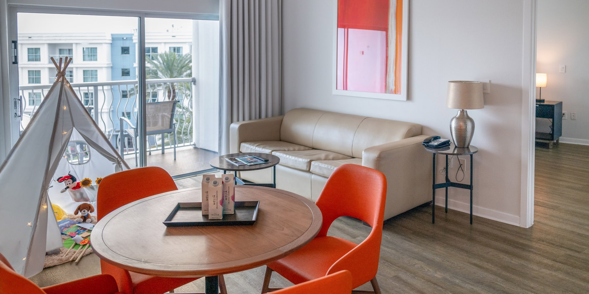 a room with a table and chairs