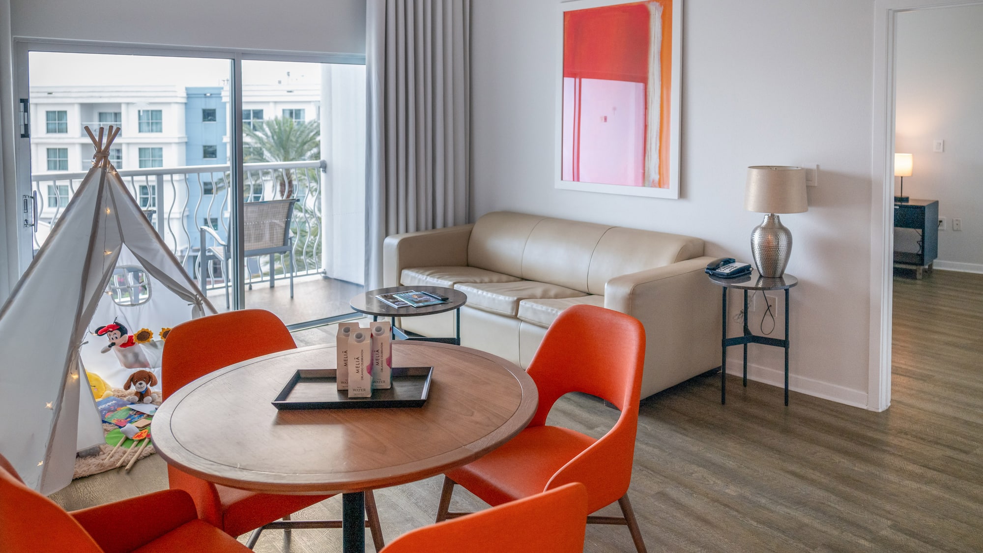 a room with a table and chairs