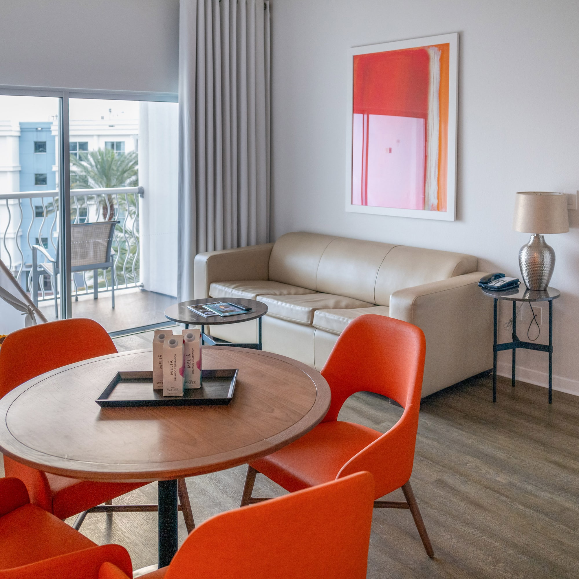 a room with a table and chairs