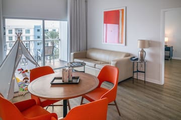 a room with a table and chairs