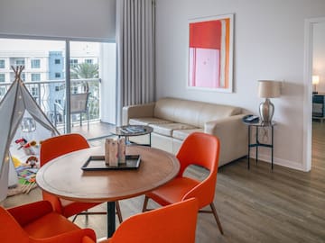a room with a table and chairs
