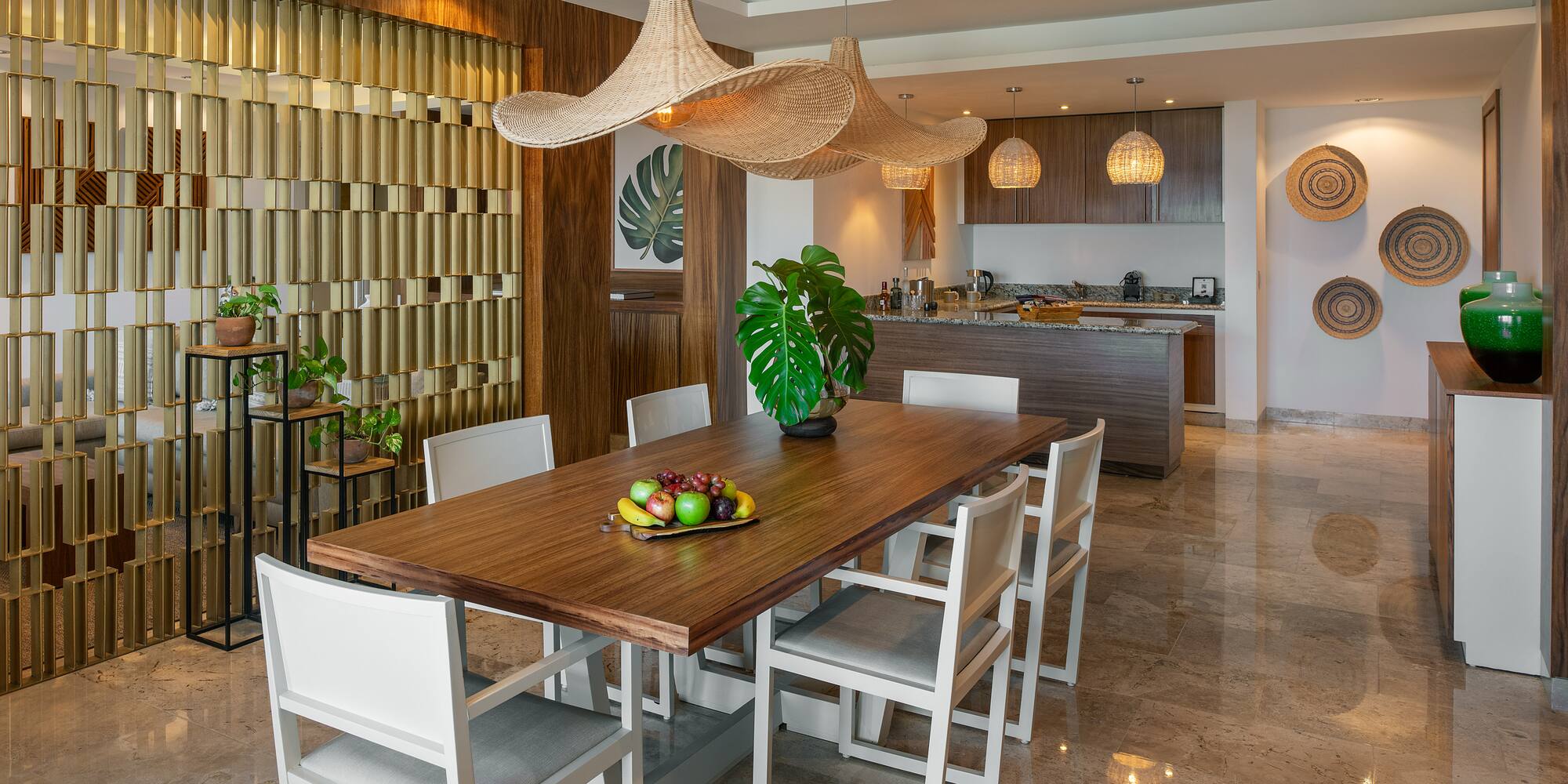 a dining table with chairs in a room