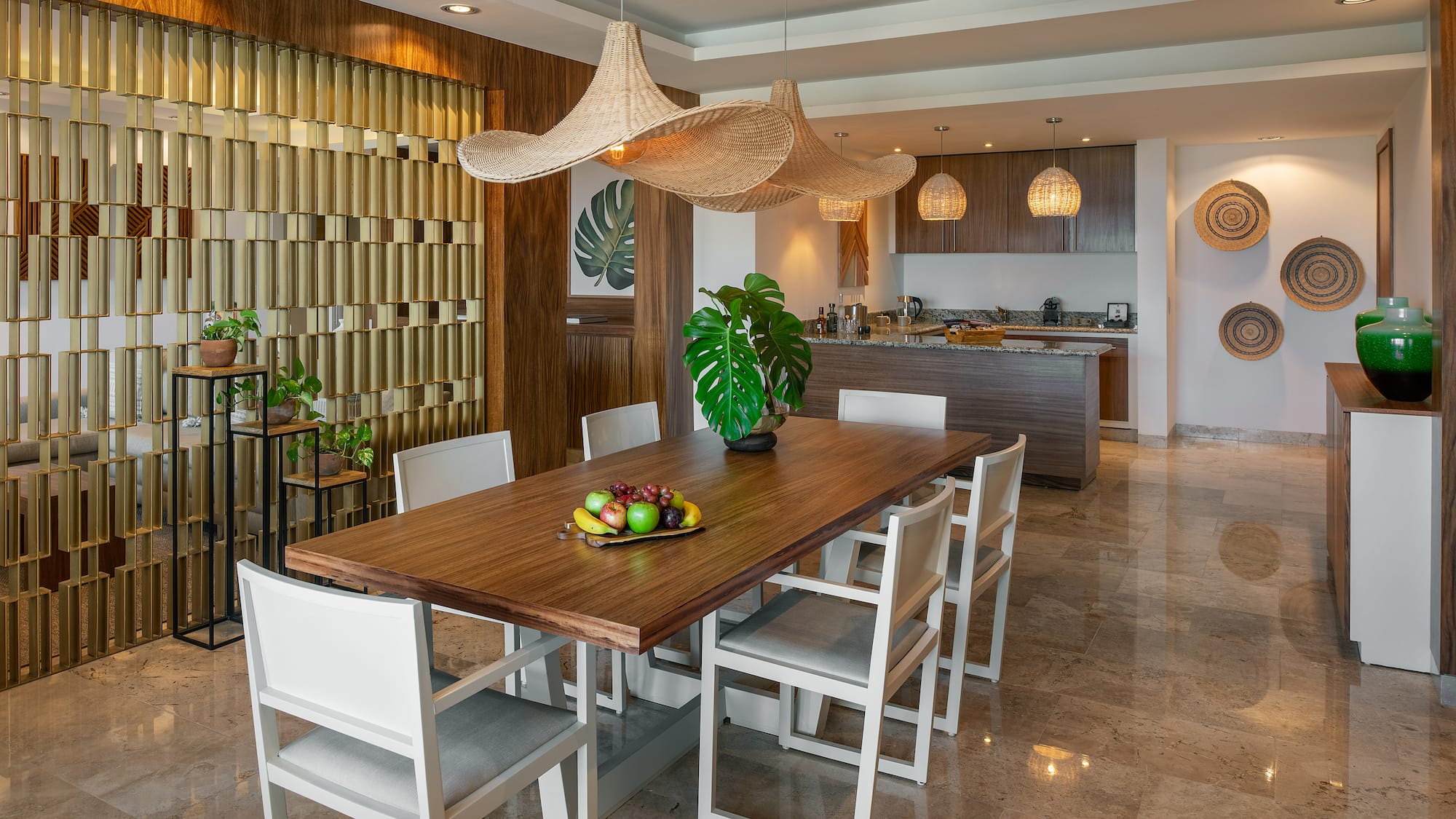 a dining table with chairs in a room