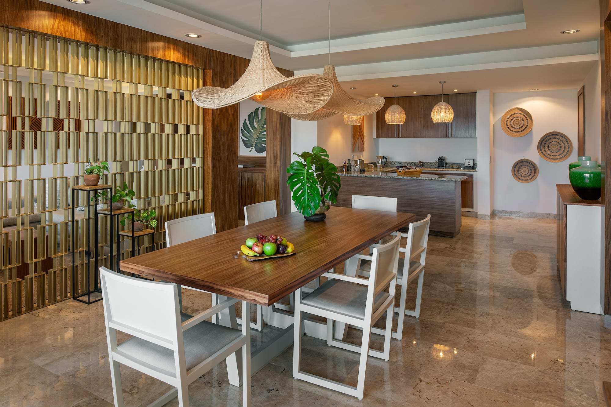 a dining table with chairs in a room