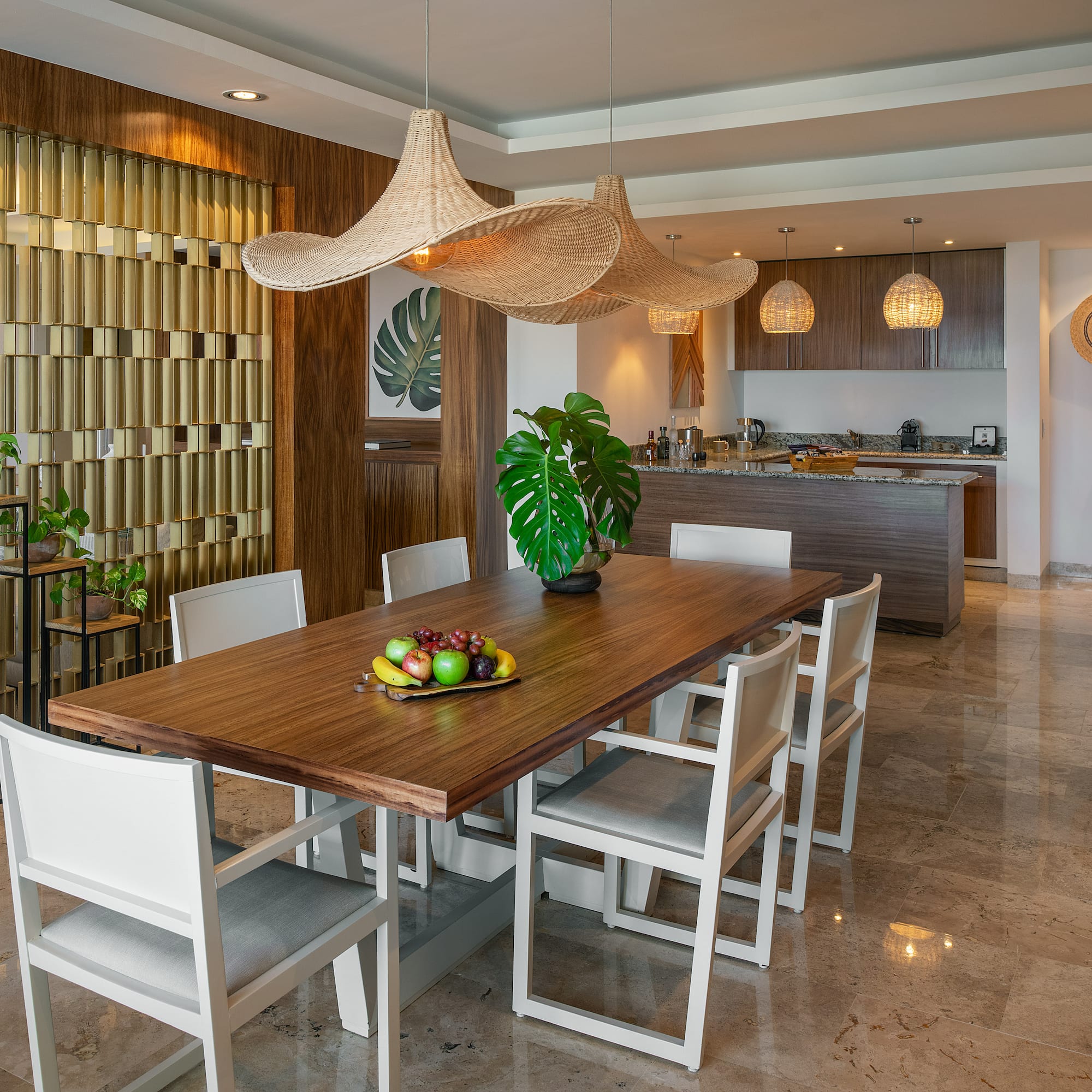 a dining table with chairs in a room
