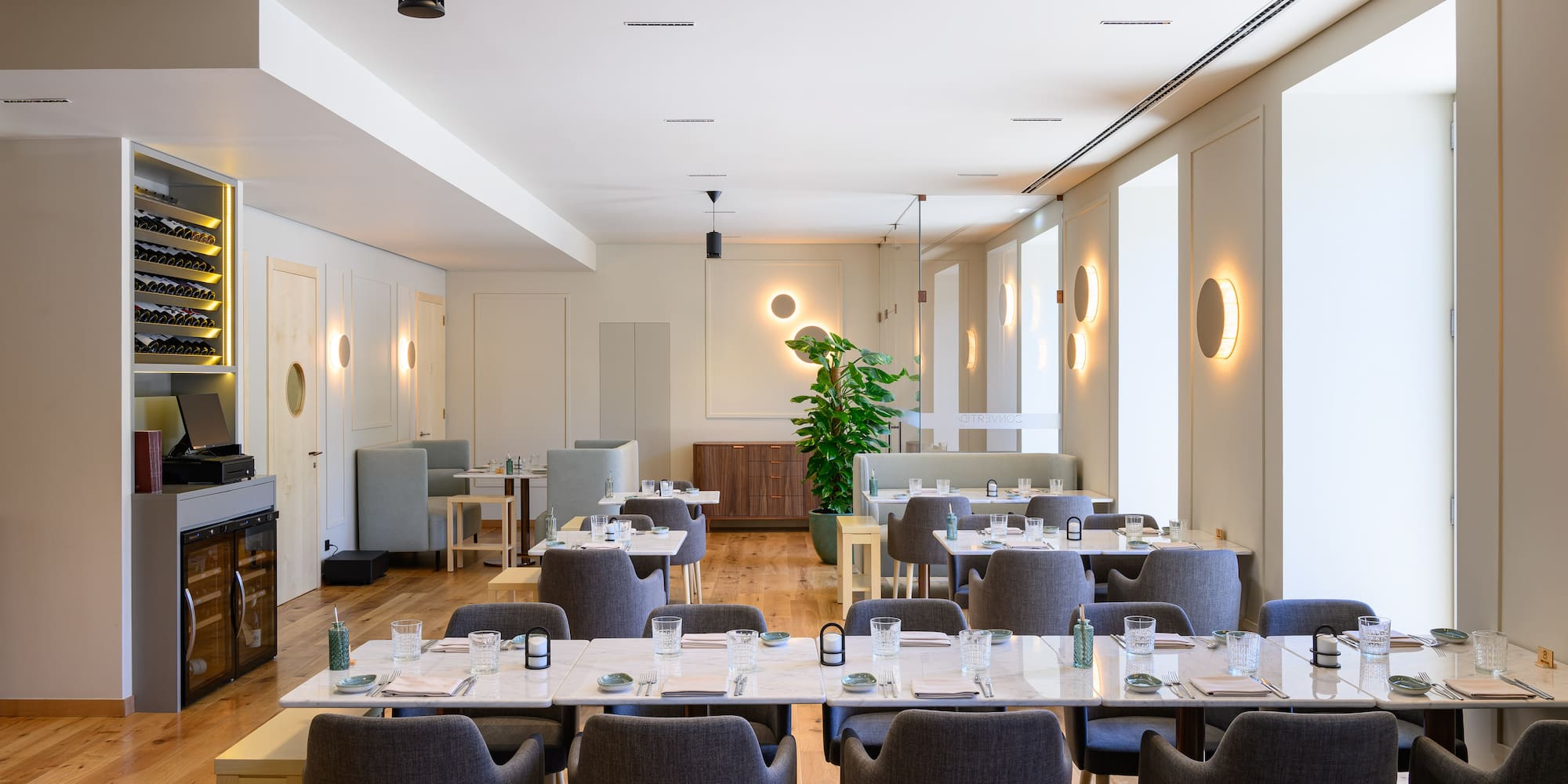 a room with tables and chairs