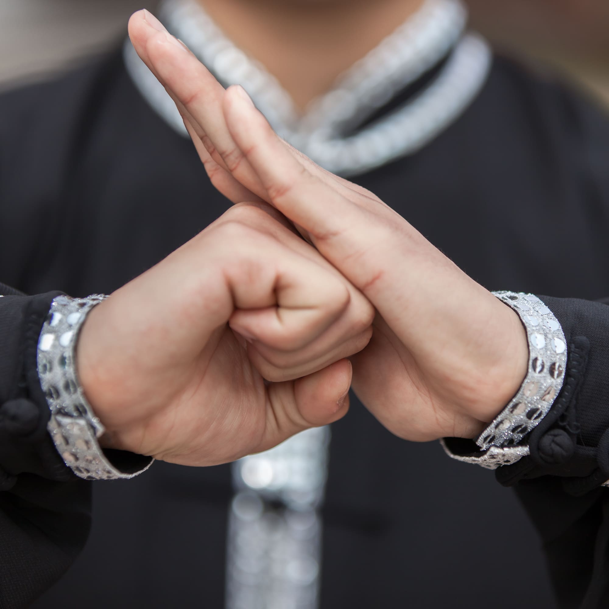 a person making a hand gesture
