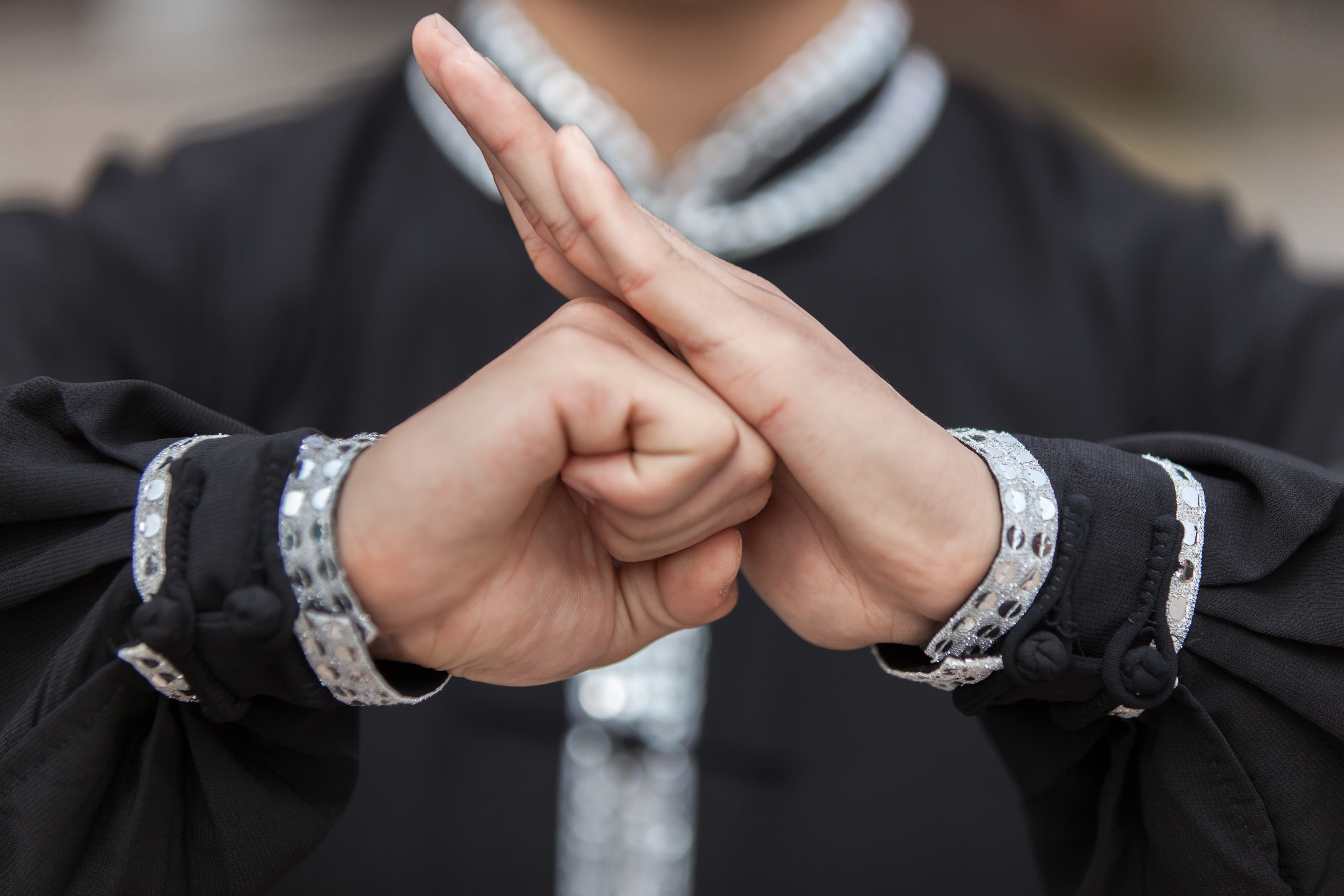 a person making a hand gesture