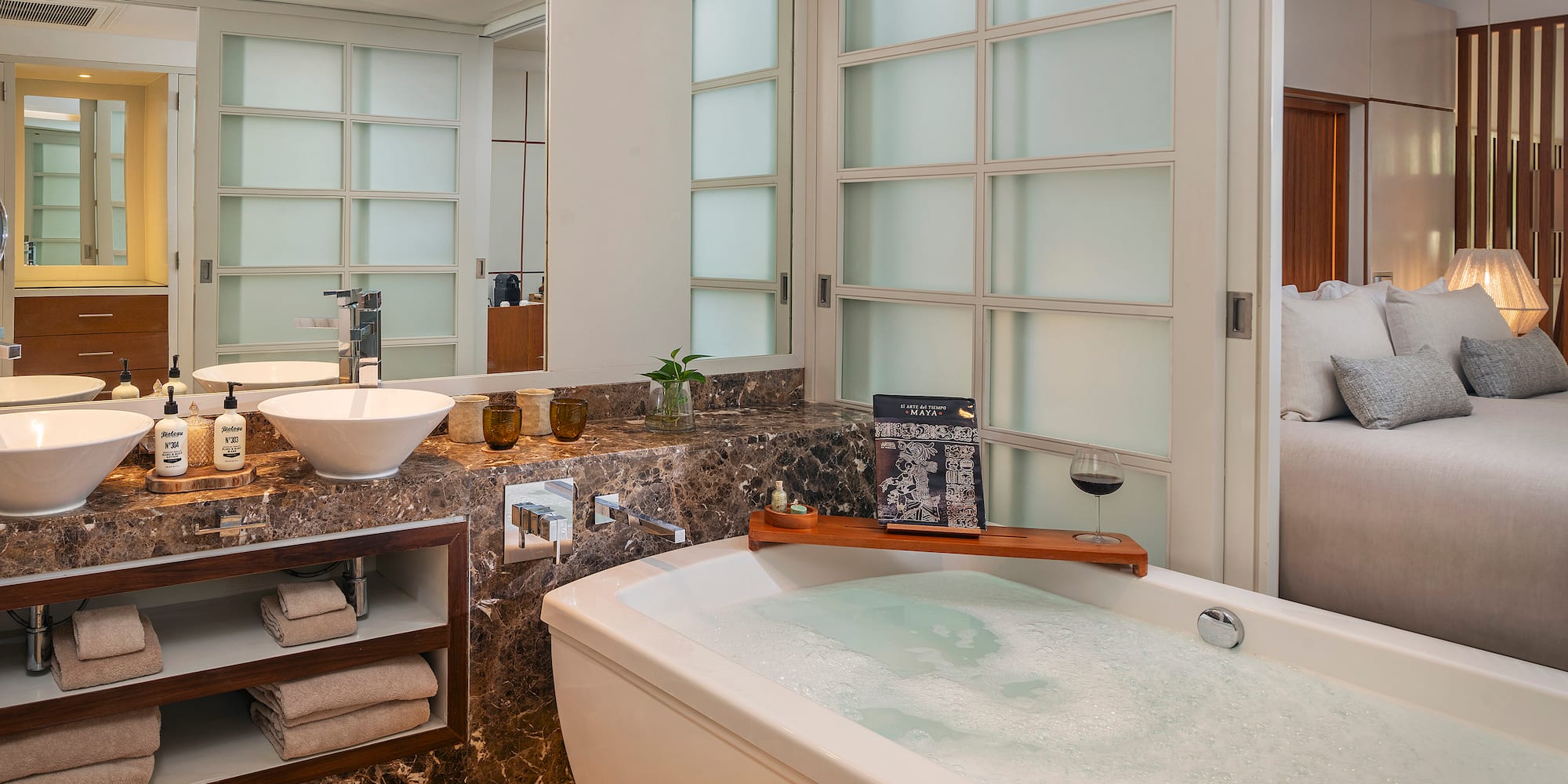 a bathroom with a tub and sink