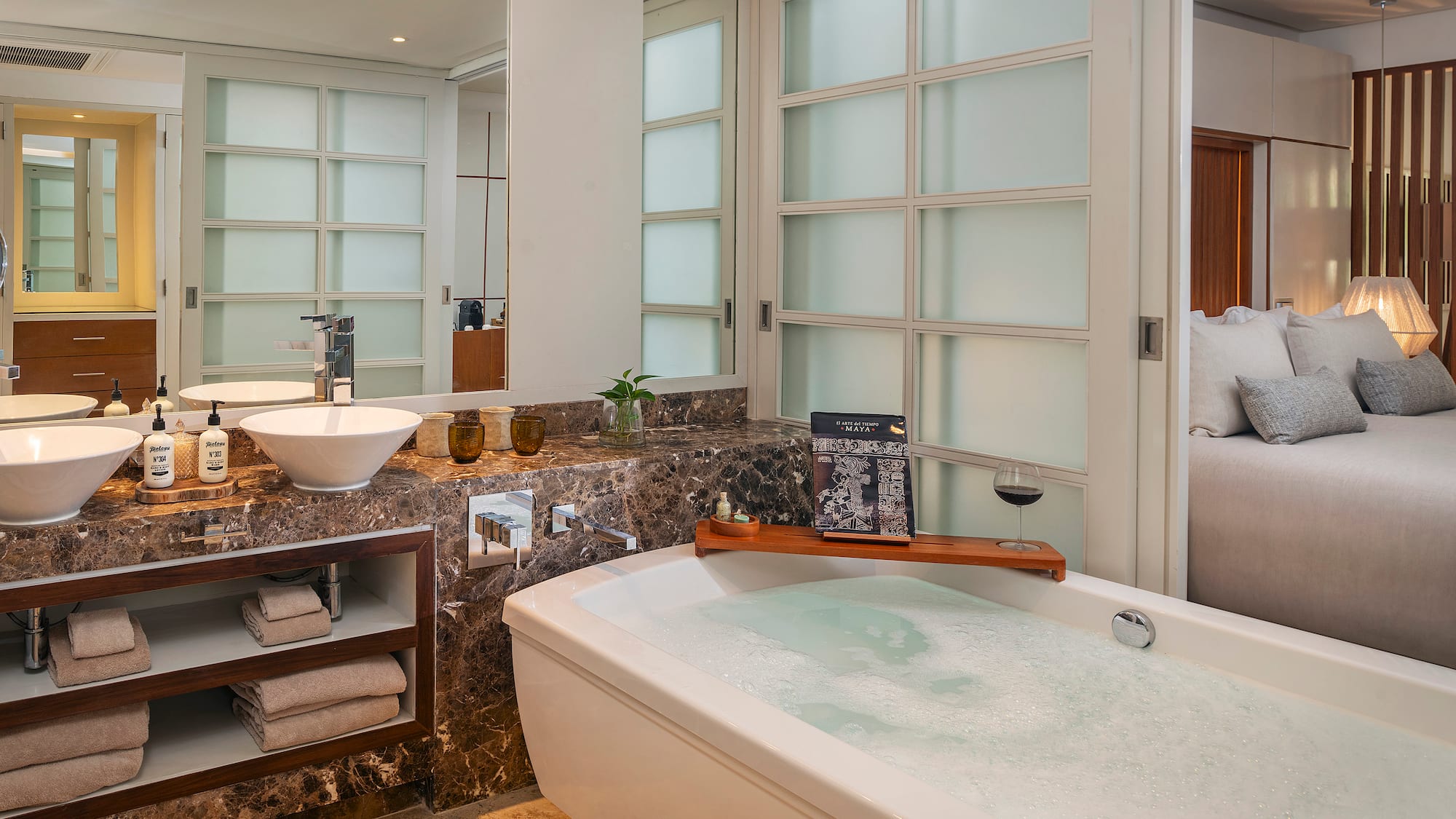 a bathroom with a tub and sink