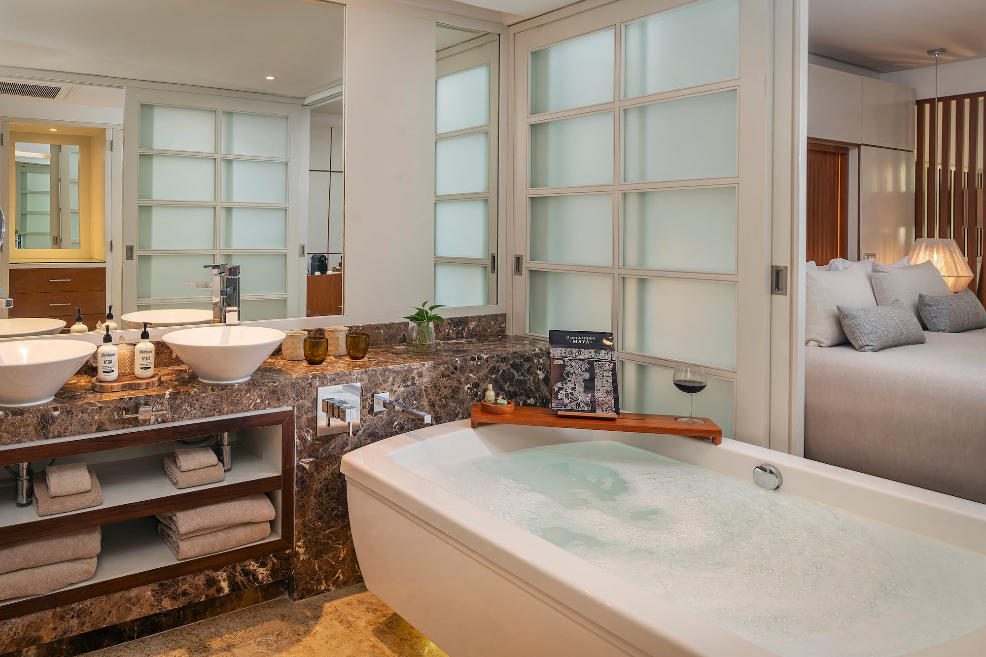 a bathroom with a tub and sink