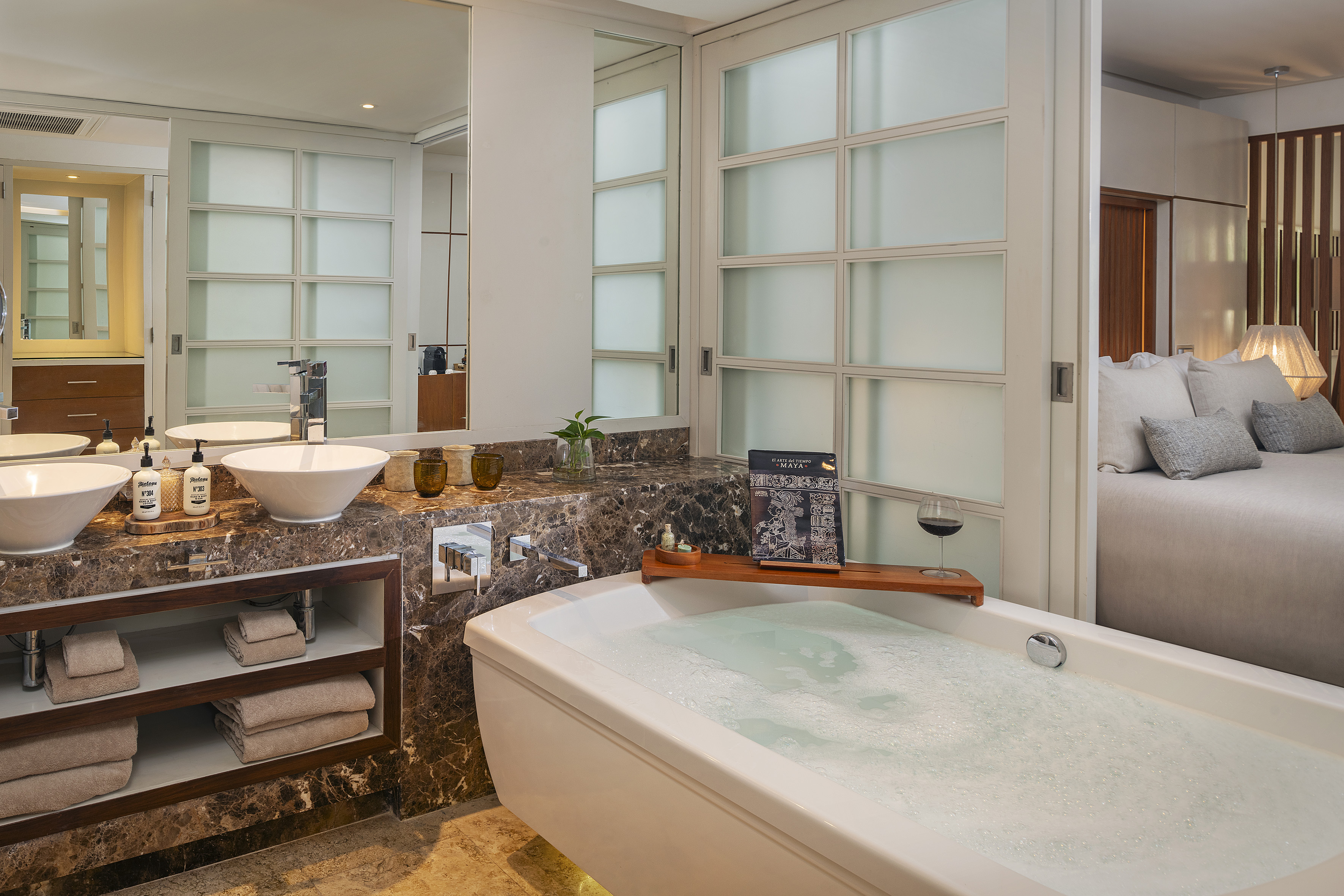a bathroom with a tub and sink